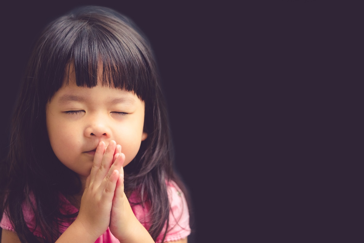 Little girl praying